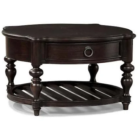 Round Cocktail Table with Scalloped Edge and Turned Pedestal Legs